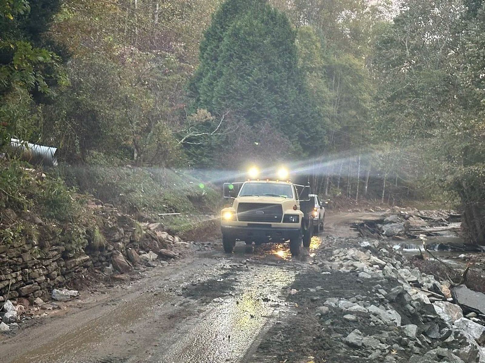 Work truck on a storm-damaged mountain road in Western North Carolina